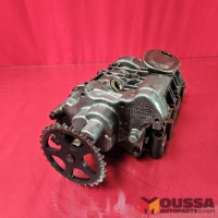 Crankshaft balancing housing