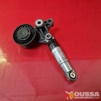 Belt tensioner vibration damper