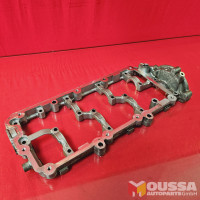 Cylinder head camshaft plate